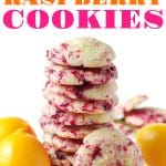 A tall stack of lemon raspberry cookies sits front and center on a white background, showcasing vibrant swirls of raspberry throughout the cookies. Fresh lemons are scattered around the base of the stack, highlighting the fresh citrus flavor. The bold, colorful text at the top reads "LEMON RASPBERRY COOKIES" in yellow, orange, and bright pink.