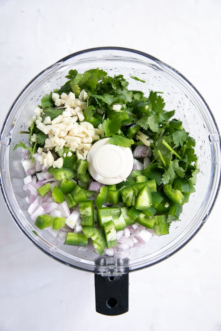 CIlantro, garlic, shallots in a large food processor.