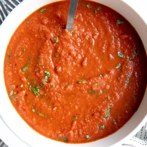 A close up of a bowl of Tomato Basil Soup