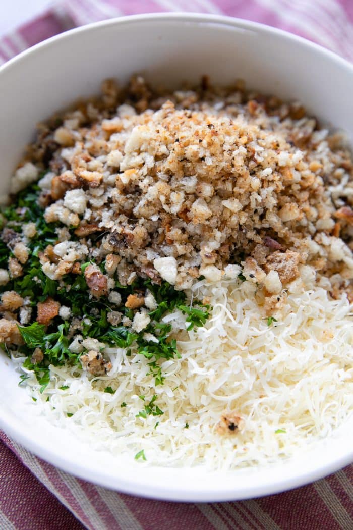 Mixture of parmesan cheese, Italian bread crumbs, parsley, and anchovies