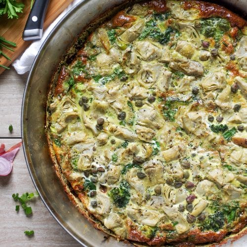 Broccoli Frittata in a pan on a kitchen counter