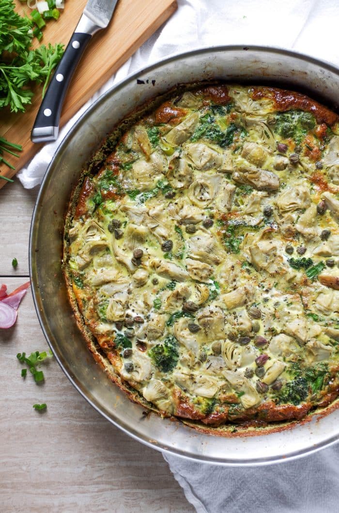 Broccoli Frittata in a pan on a kitchen counter