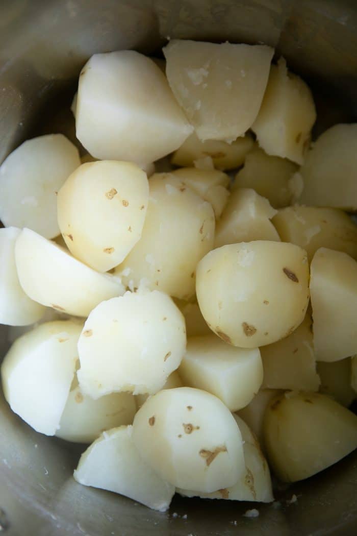 Boiled and quartered peeled russet potatoes.