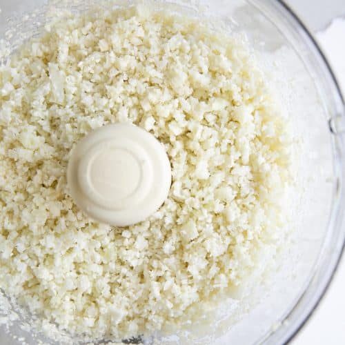 Cauliflower that has been processed into "rice" in the food processor.