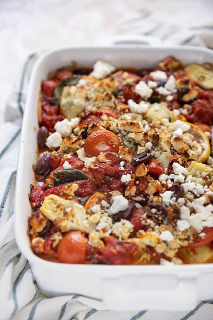 The Mediterranean baked fish in a casserole dish close up