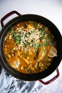 a pan of Moroccan chicken stew in a pot