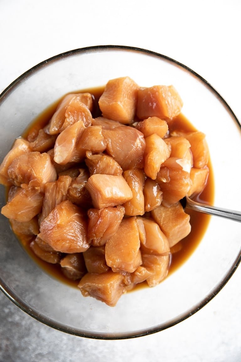 A bowl of chicken in sauce