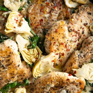 A close up of spinach artichoke chicken