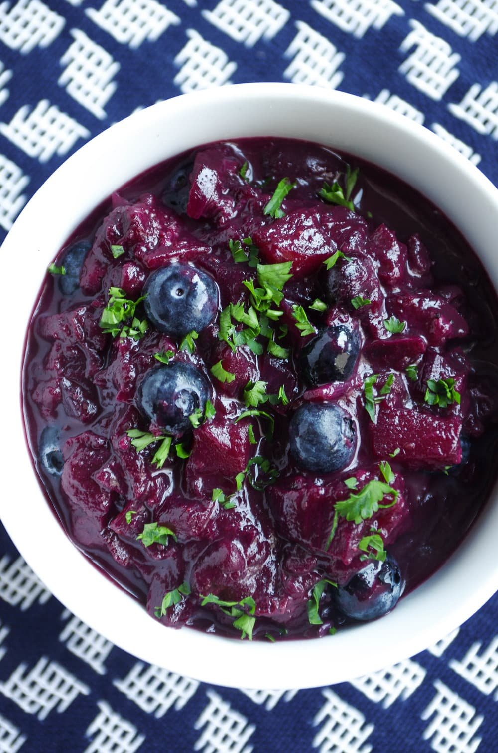 Close up of white bowl full with Blueberry Apple Compote