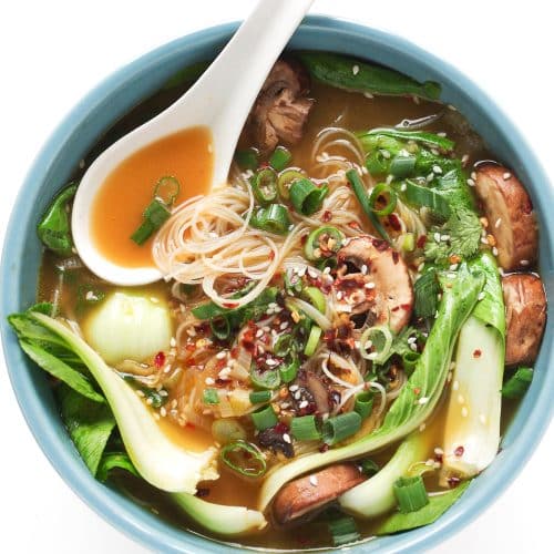 Bowl with Garlic Noodle Soup With Bok Choy, chicken broth, mushrooms, onions, sesame seeds