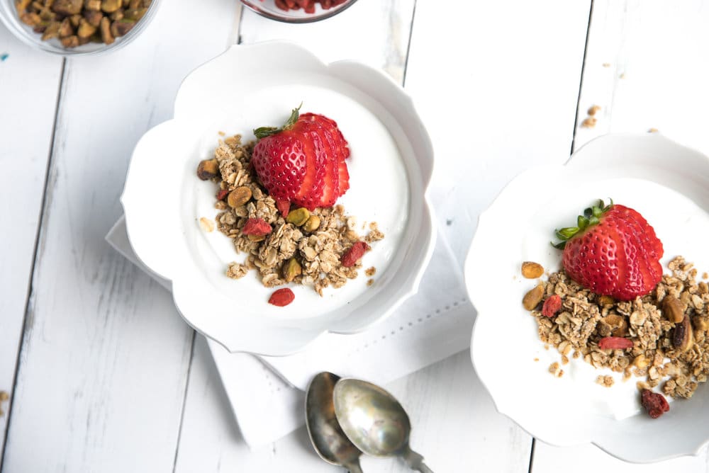 plain greek yogurt and topped with homemade lightly sweetened granola.