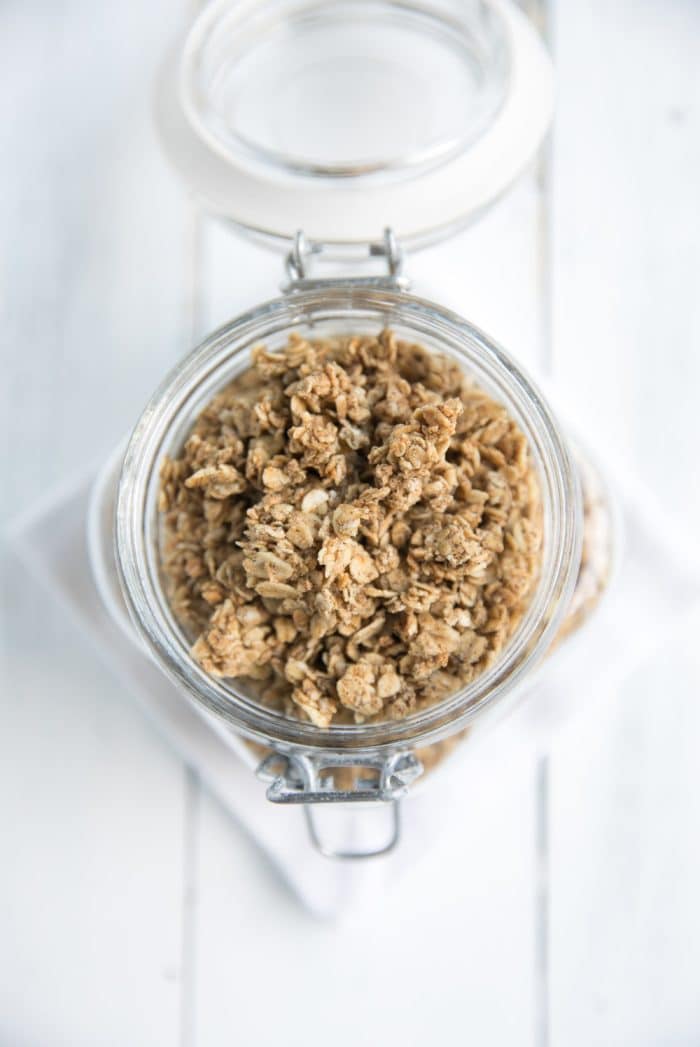 Glass canister filled with homemade granola.