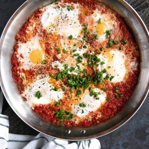 A Shakshuka in a pan on a table