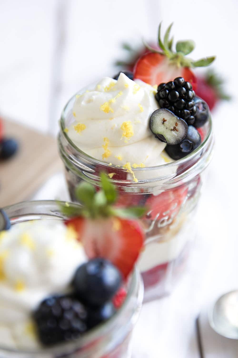 glasses filled with Berries, Lemon Cake and Honey Lemon Yogurt Mascarpone Cream