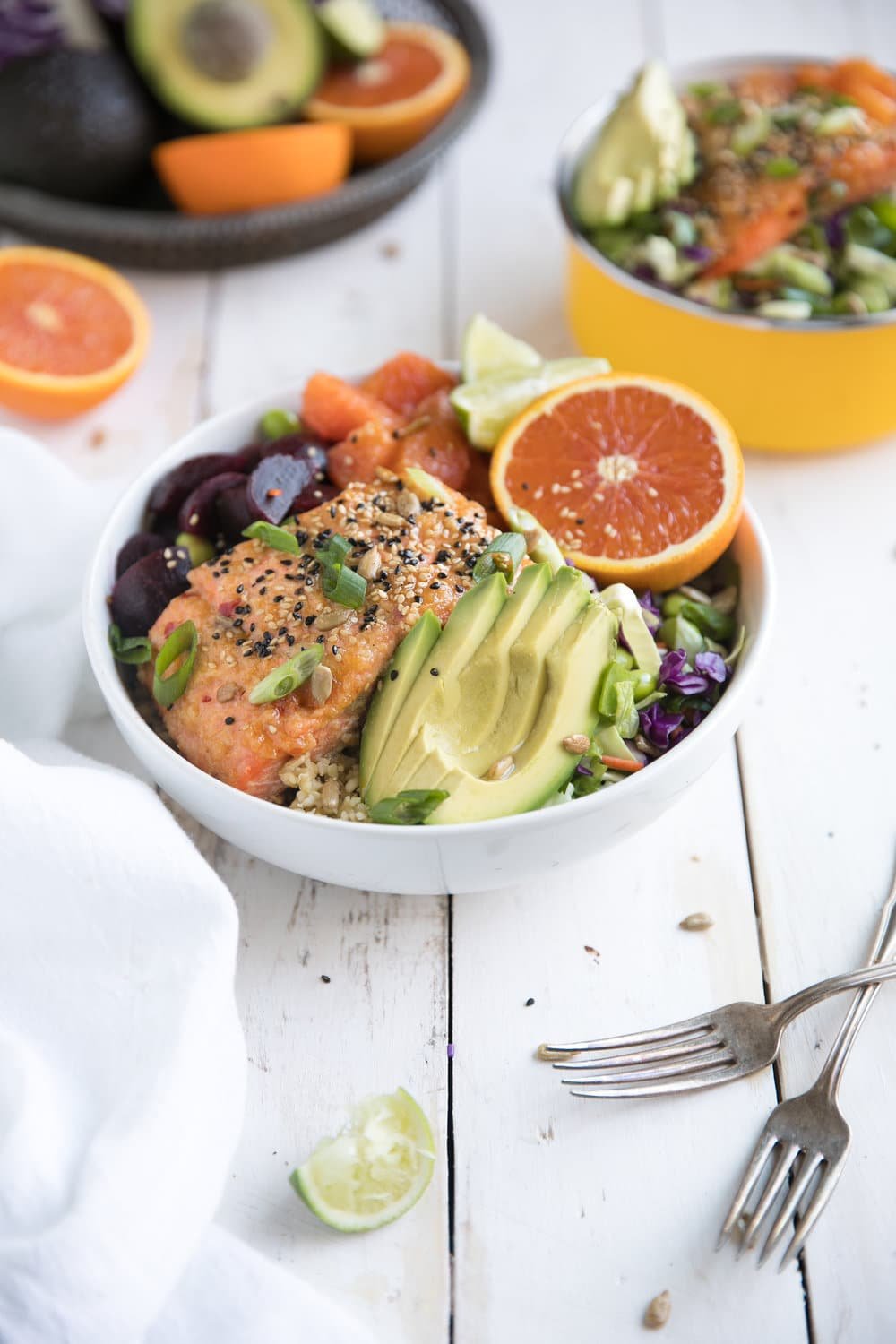 Super healthy foods like freekeh, beets, oranges, and avocado are just part of what make this nutritious 30 minute Sweet Chili Miso Salmon Salad a dinner win any night of the week!