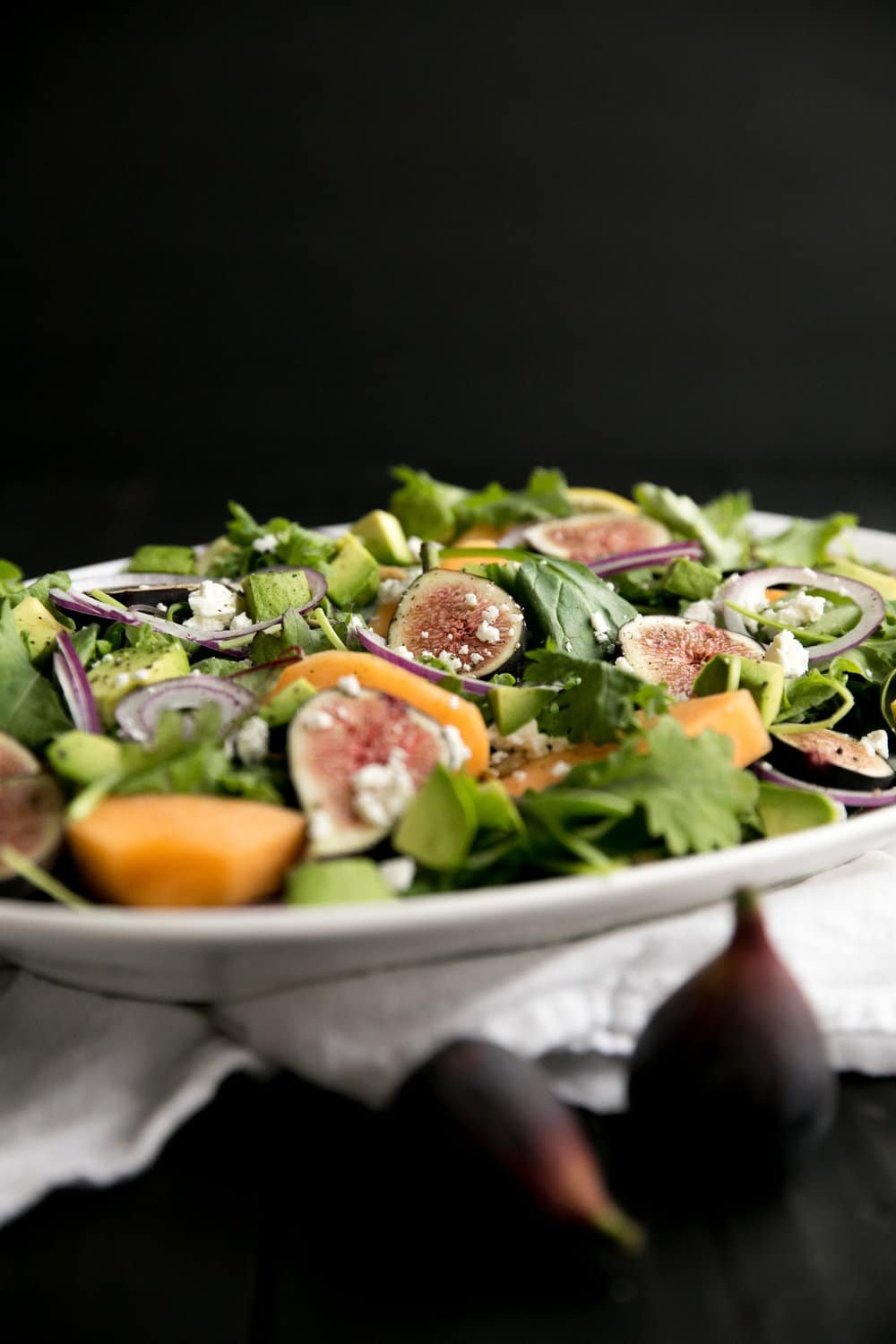 horizontal image of plated fig salad