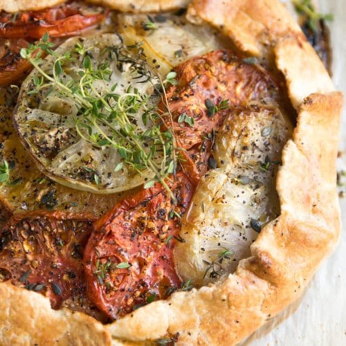 A close up of food, with Tomato Galette and Honey
