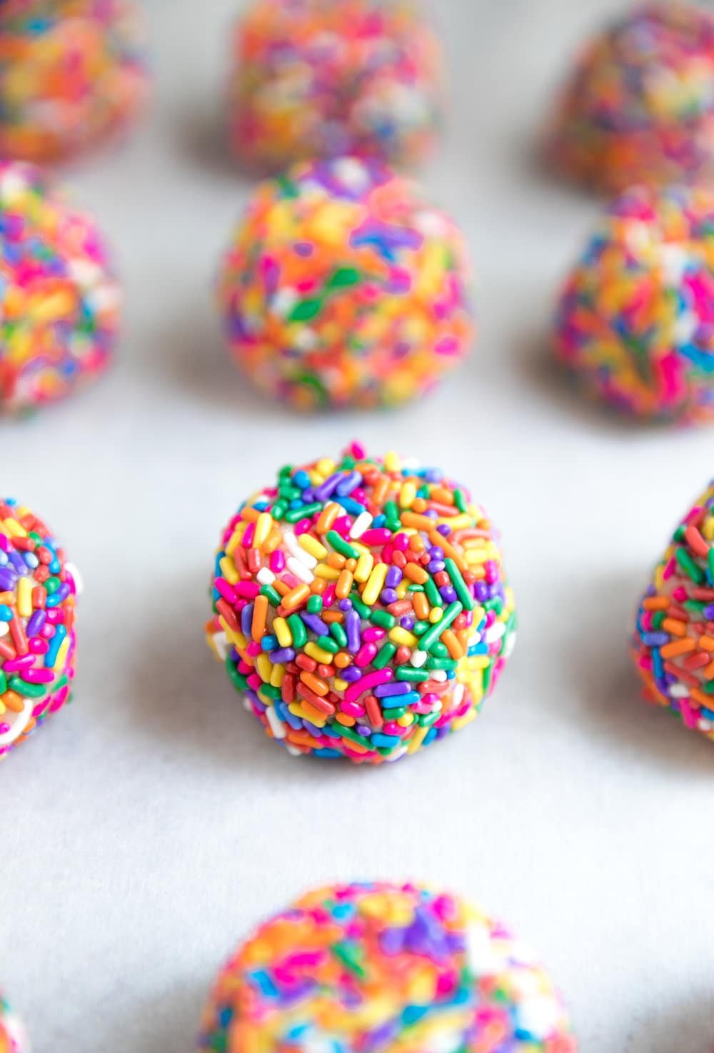 diagonal photo of Rainbow Sprinkle Cookies