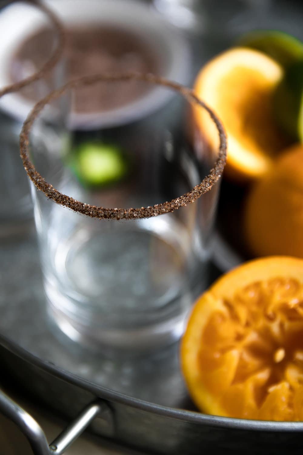 Perfect balance between salty, sweet and spicy, these Spicy Orange Margaritas with Agavero Orange Liqueur are guaranteed to be the life of any (21 years and older) party!