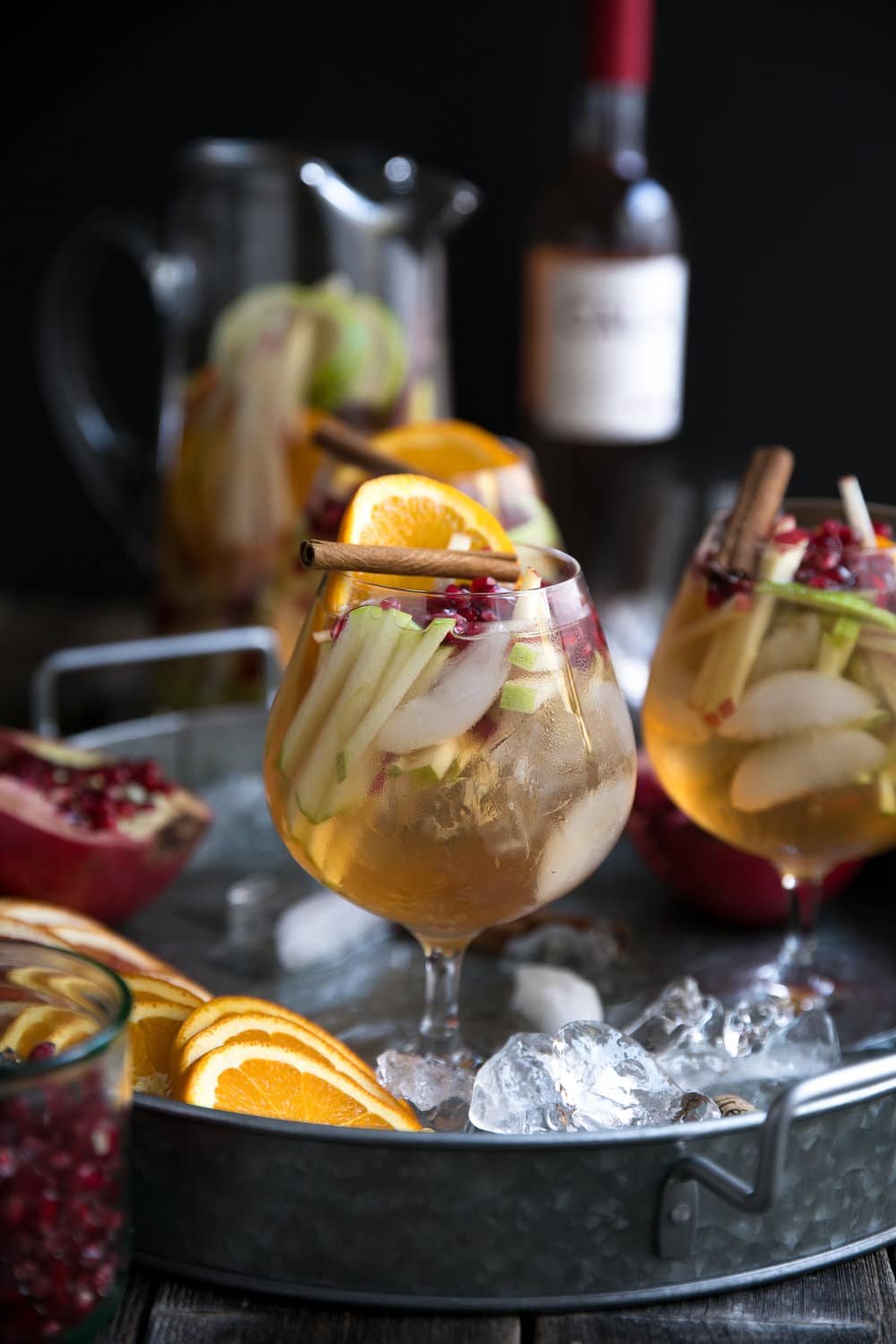 side photo of Autumn Rosé Sangria with Apples and Pomegranates in two glasses