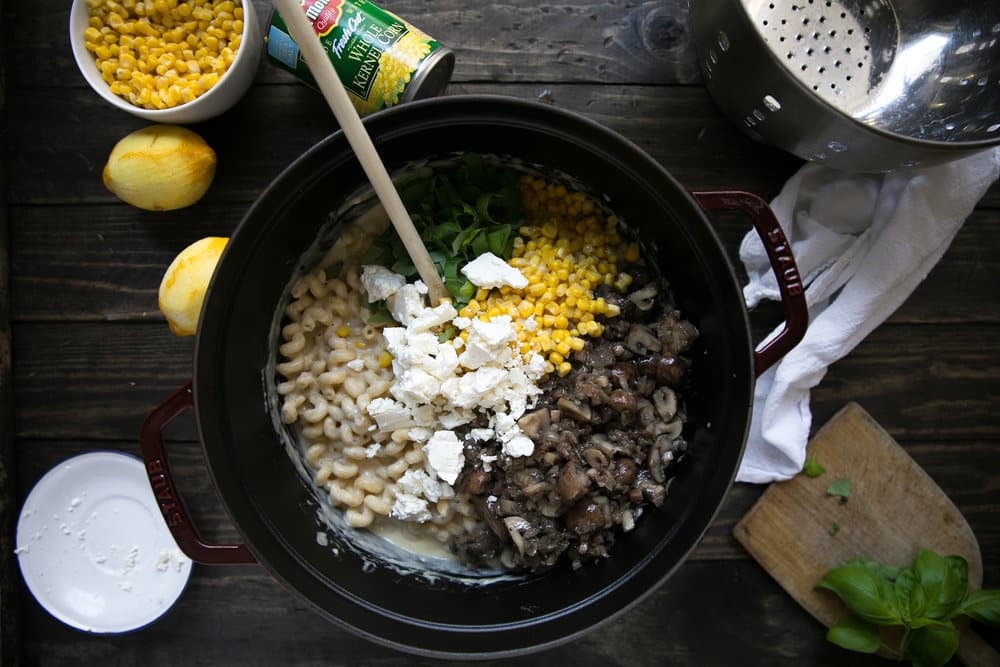 dutch oven filled with all Creamy Cowboy Stovetop Macaroni and Cheese ingredients