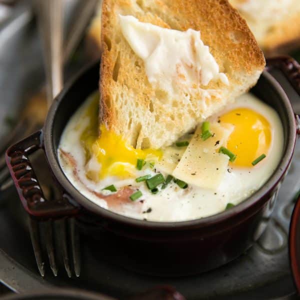 Creamy Baked Eggs with Spinach and Prosciutto - The Forked Spoon