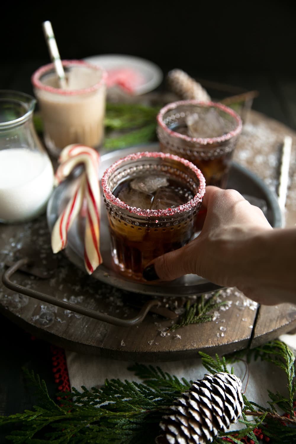 Holiday Peppermint White Russian. Made with Kahlúa, Peppermint Schnapps, and Vodka, this delicious cocktail is perfect for the cold holiday season.