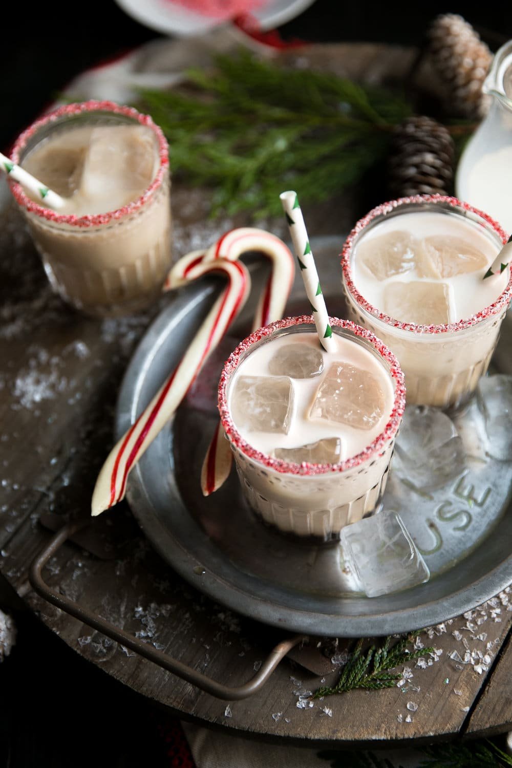 Holiday Peppermint White Russian. Made with Kahlúa, Peppermint Schnapps, and Vodka, this delicious cocktail is perfect for the cold holiday season.