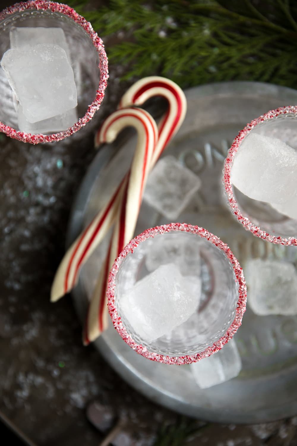 Holiday Peppermint White Russian. Made with Kahlúa, Peppermint Schnapps, and Vodka, this delicious cocktail is perfect for the cold holiday season.