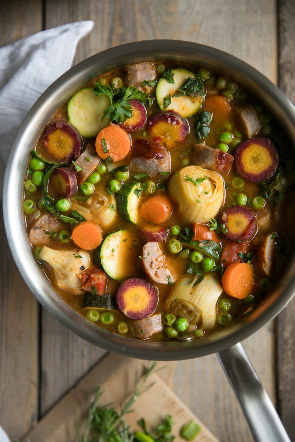 Sausage and Vegetable Soup with Easy Basil Pesto. Filled with fresh vegetables and juicy sausage, this delicious and colorful Sausage and Vegetable Soup is topped with Easy Basil Pesto.