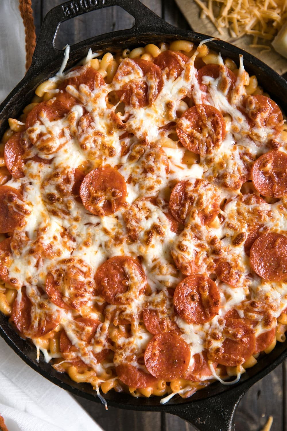 Pepperoni Pizza Mac n Cheese Skillet. Addicting creamy, cheesy noodles baked in a skillet covered with pepperonis.