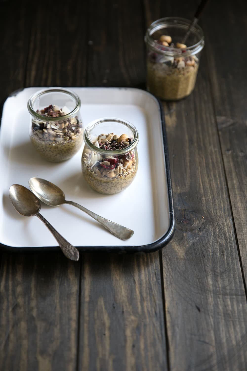 diagonal photo of Butternut Squash Chia Pudding in three glass jars