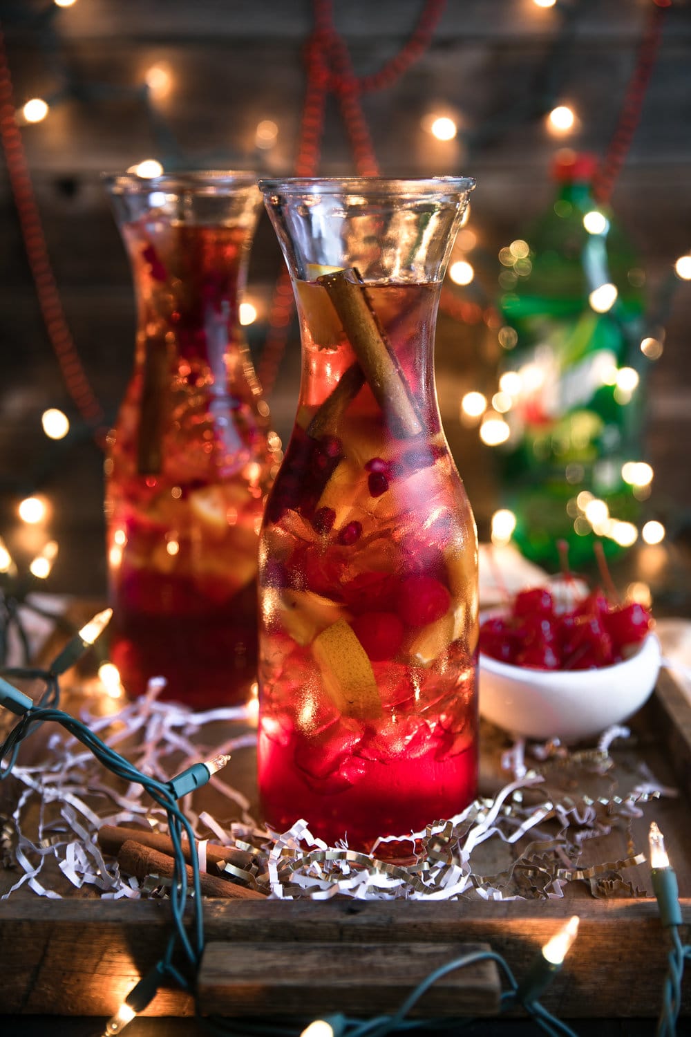 A close up of a glass on a table, with Cinnamon and Spritzer