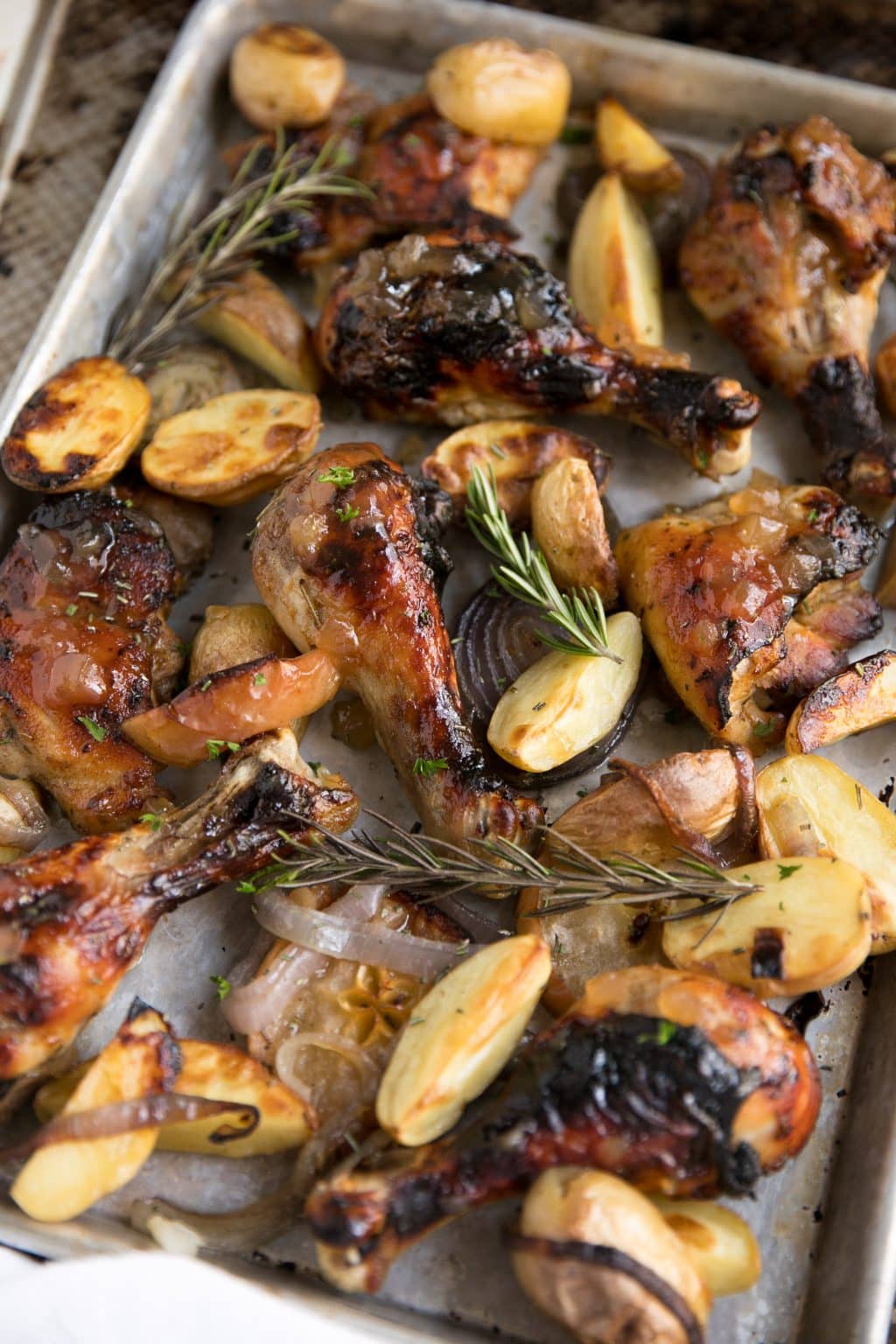 https://theforkedspoon.com/wp-content/uploads/2018/01/Apple-Butter-Roasted-Chicken-with-Onions-and-Potatoes-4.jpg