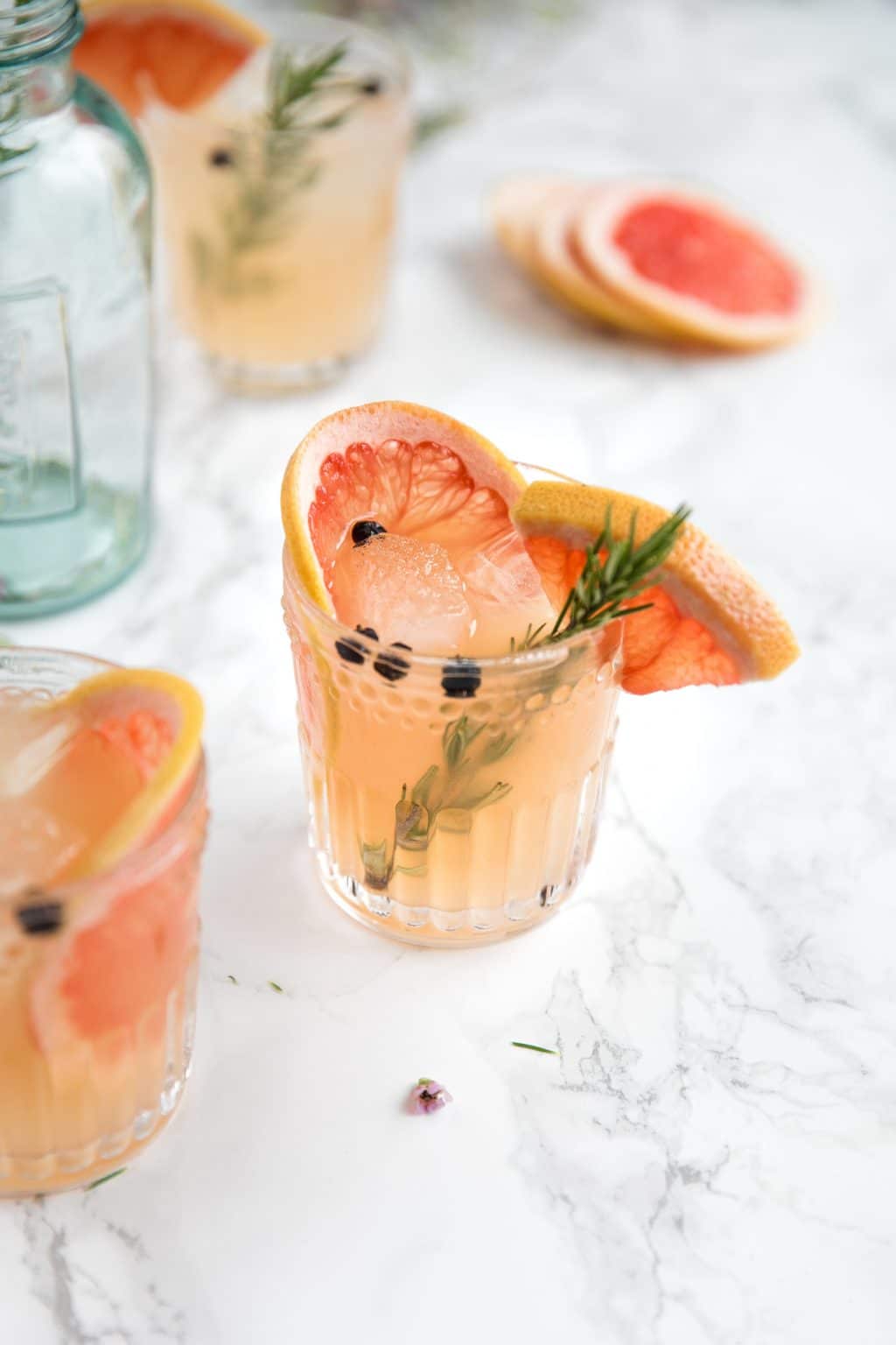 Sweet pink grapefruit juice, fragrant rosemary, and Elderflower Liqueur are added to gin and tonic to make a fresh, refreshing, and fun Elderflower Grapefruit Gin and Ton