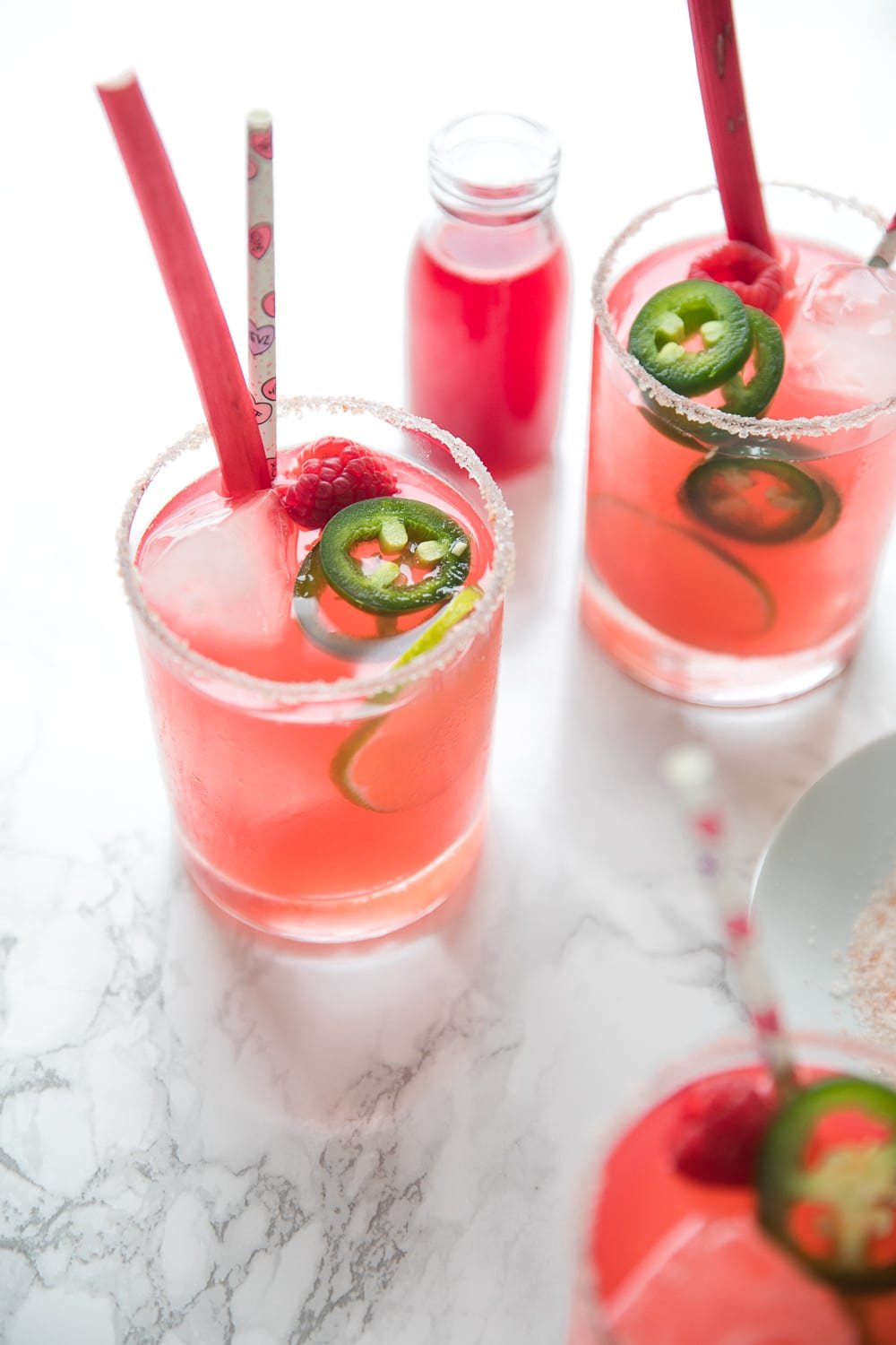 Sweet and Spicy Raspberry Rhubarb Margaritas with homemade Raspberry Rhubarb Syrup
