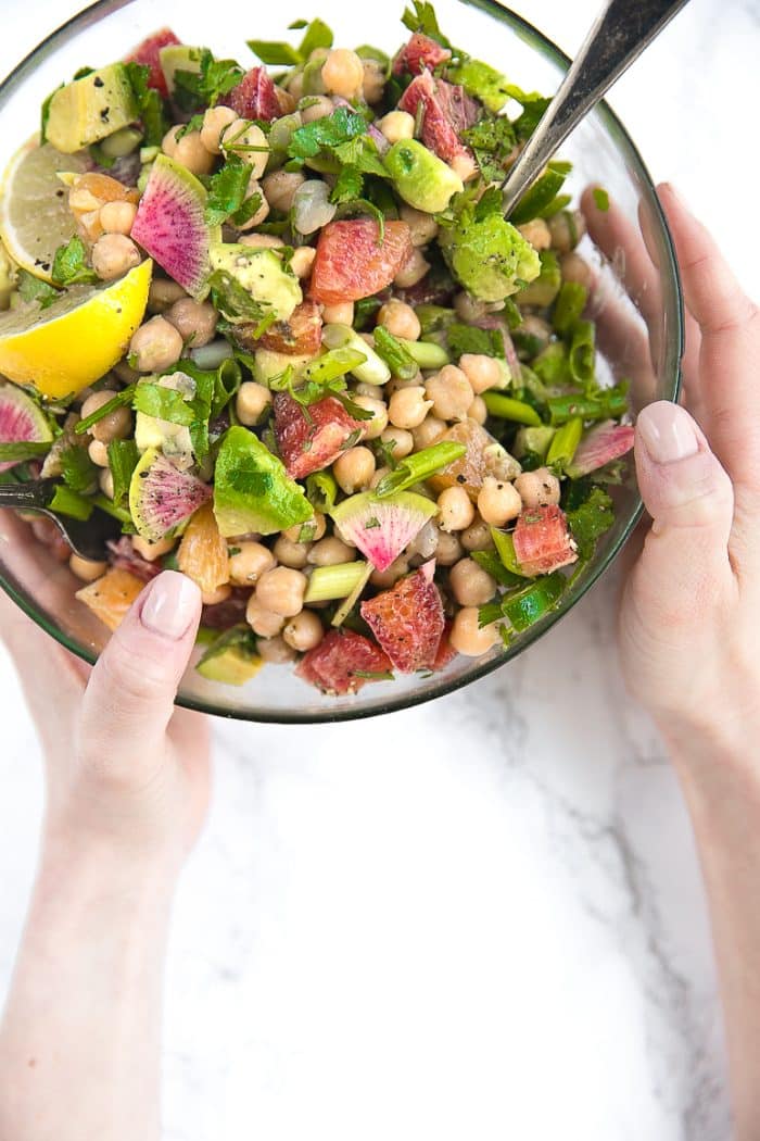 Fresh, healthy, and completely vegetarian, this Avocado Citrus Chickpea Salad is loaded with sweet blood oranges, creamy avocados, spicy green onion, spicy jalapeño, and cilantro. Summertime dinner magic that takes little more than 10 minutes to throw together.