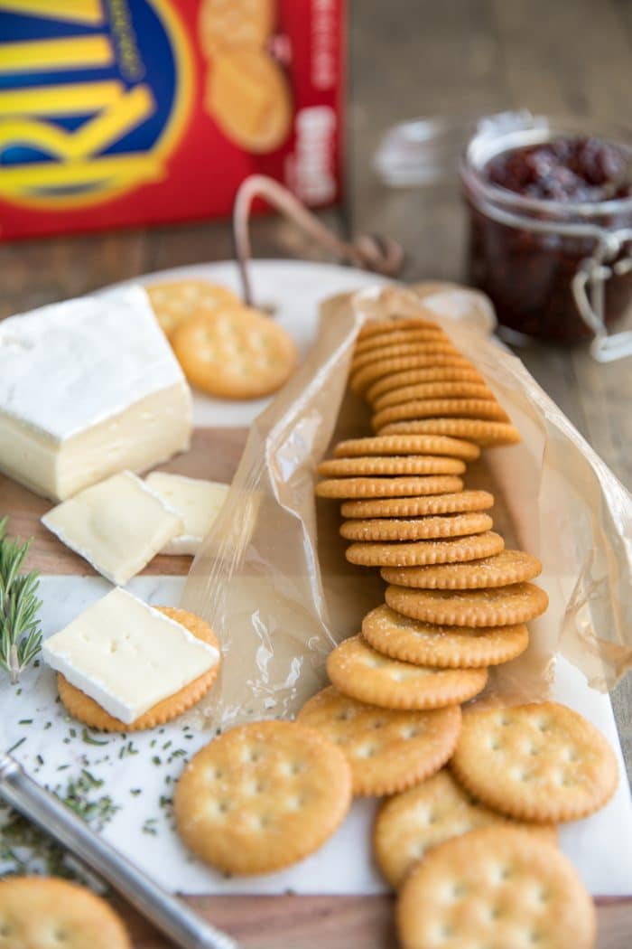 RITZ Cracker, Brie, and Jam bites are the perfect combination of salty, sweet, and savory and take just minutes to prepare.