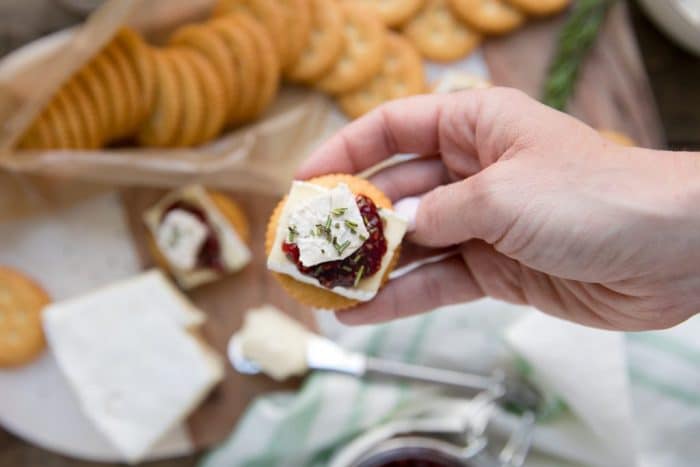 RITZ Cracker, Brie, and Jam bites are the perfect combination of salty, sweet, and savory and take just minutes to prepare.