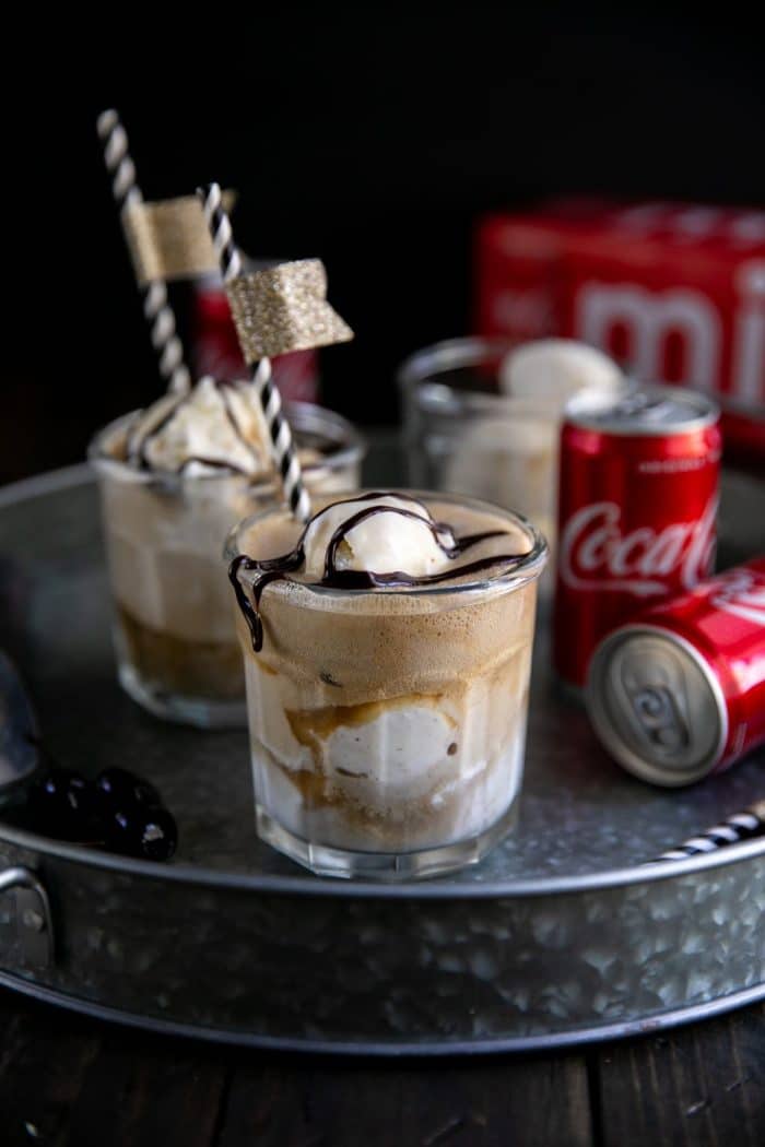 Coke floats with chocolate syrup