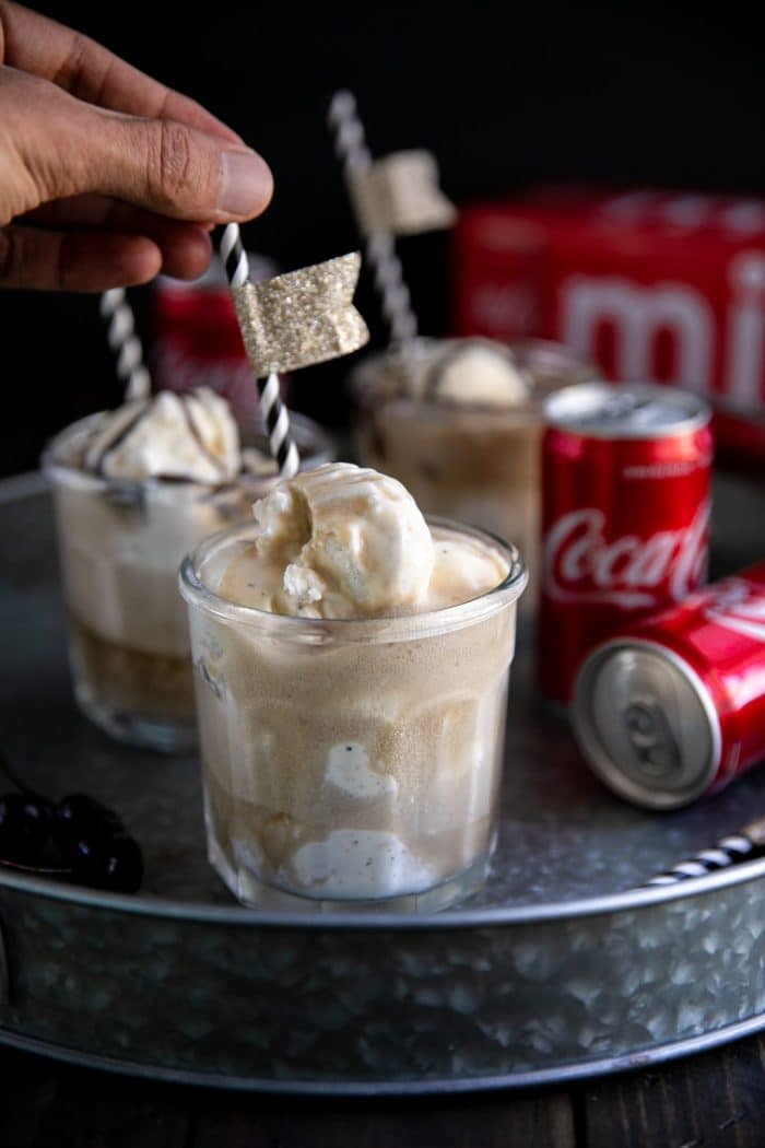 Coke ice cream float with flag straws