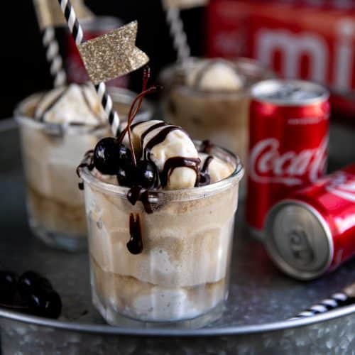 Backyard campout complete with Coca-Cola Ice Cream Floats made with crisp, cold and refreshing Coca-Cola, creamy vanilla ice cream, and smooth chocolate syrup.