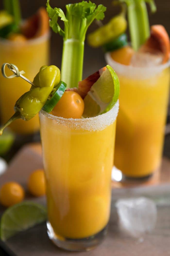 Cheers to the weekend with this nutrient (and vodka) filled Golden Beet and Tomato Bloody Mary. Made with golden beets, yellow heirloom tomatoes, vodka, and all the fixings, these beautiful Bloody Mary's are delicious, and just what your next brunch party calls for.