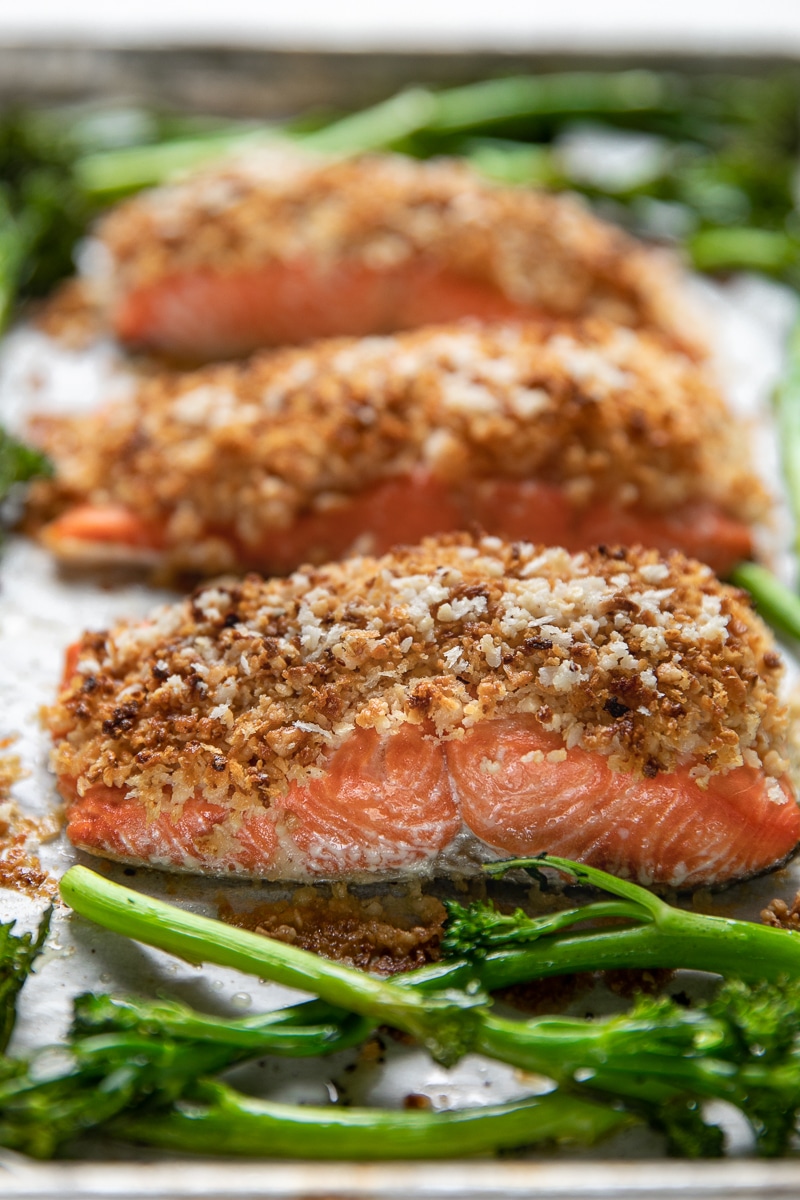 Fresh fruit salsa, quinoa, and roasted broccolini pair up with Omega-rich salmon in this crazy easy and super healthy Macadamia Crusted Salmon with Pineapple Mango Salsa.
