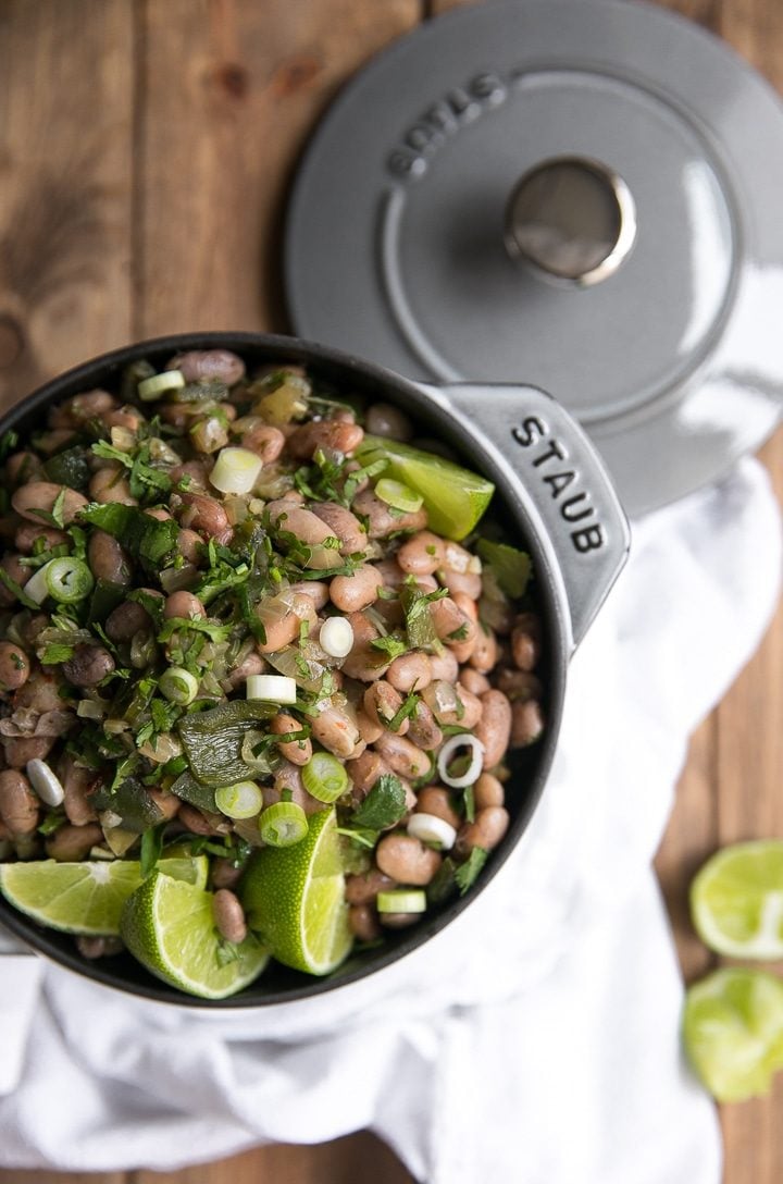 A fun and flavorful twist on boring bland beans, these easy Drunken Beans with Poblanos taste fantastic eaten alone or paired with all your favorite Mexican dishes.