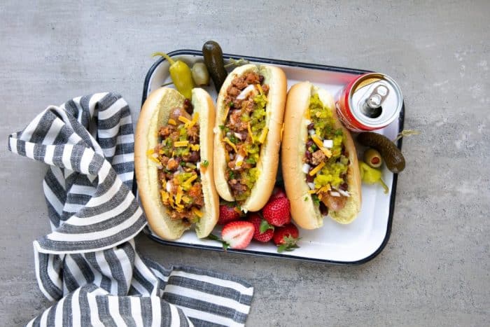 Loaded sausage dogs with coca-cola chili