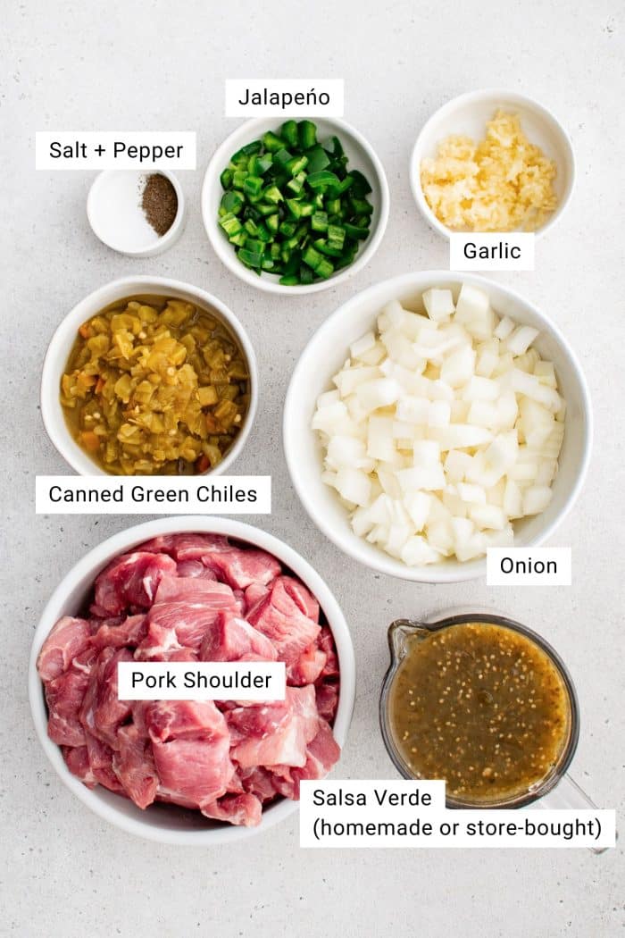 All ingredients for Crock Pot Chili Verde recipe are presented in individual measuring cups and ramekins.