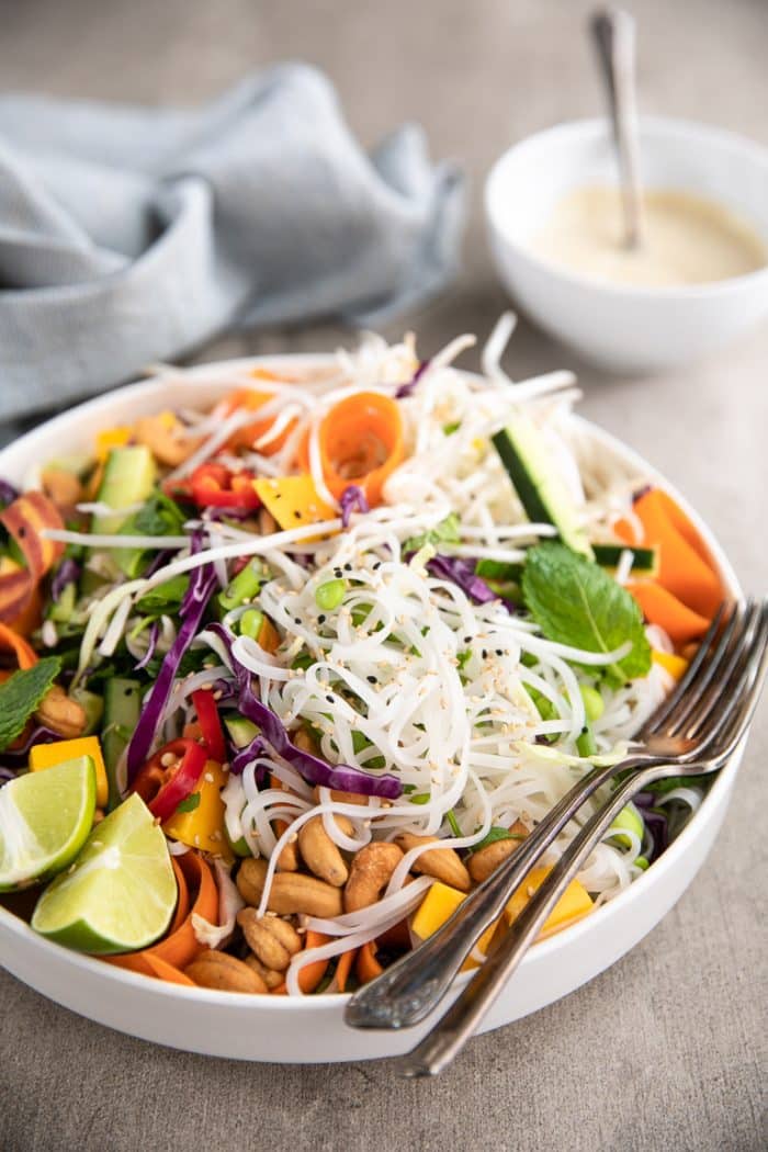 Large white bowl filled white Cold Thai Noodle Salad