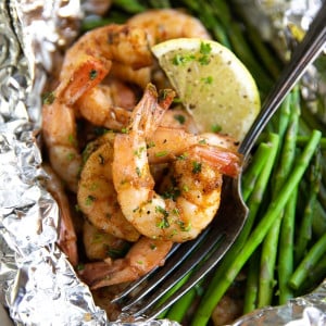A close up of cajun shrimp in foil Packet