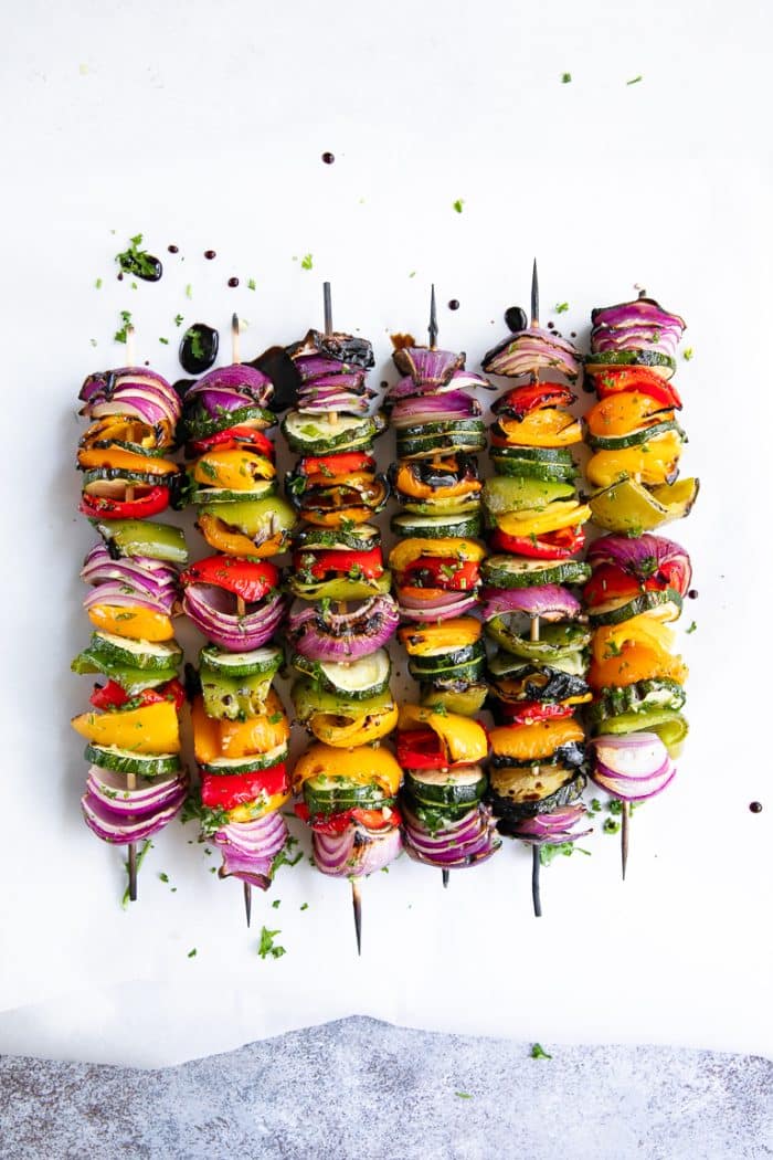 vegetable skewers drizzled with balsamic vinegar